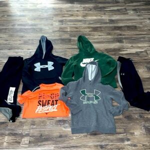Nike and under Armour boys lot. Size medium in very good condition